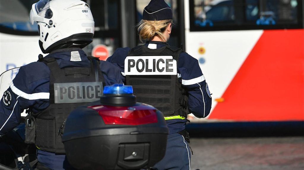 0 Two Police officers on a street in Paris France
