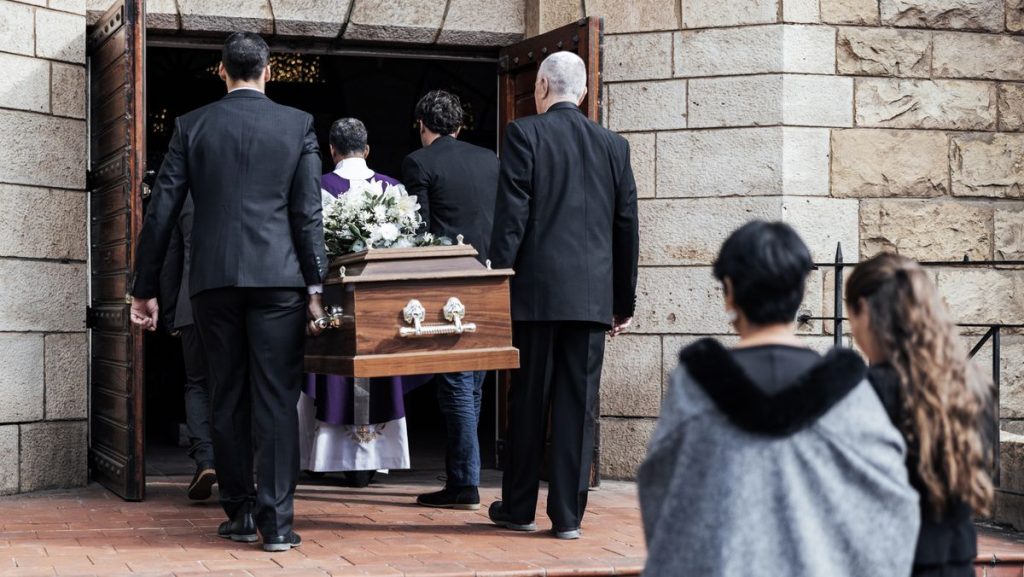 2 Death funeral and people with coffin to church chapel service and ceremony for temple ritual RIP