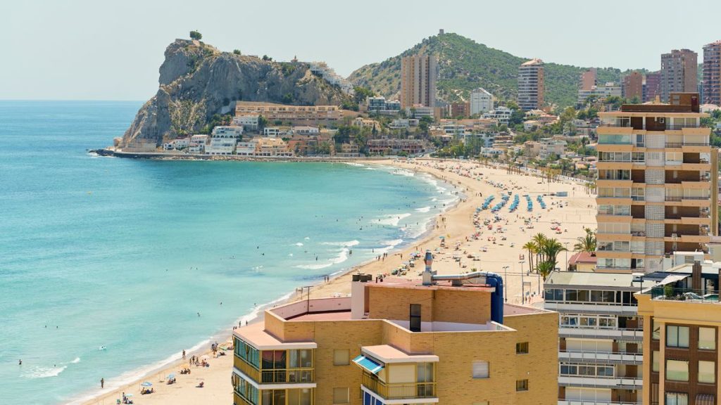 Murcia earthquake as popular Spanish holiday hotspot for Brits rocked by 4.1 magnitude 11 0 Benidorm beach coastline with Mediterranean Sea and resort buildings