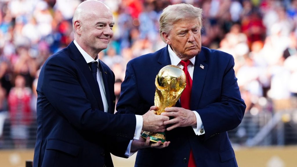 0 Gianni Infantino and Donald Trump File Photo