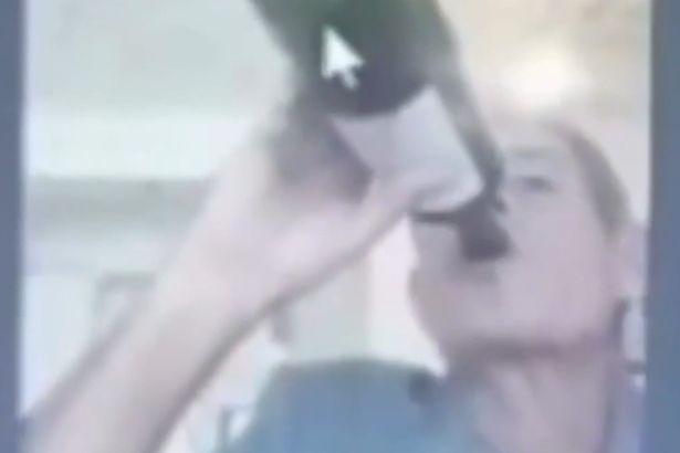 0 VIDEO Judge necks wine from bottle and lights cigarette with blowtorch during live hearing