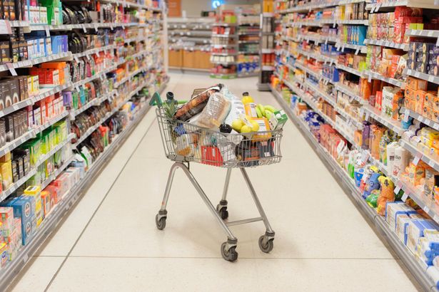 0 Supermarket trolley filled with groceries