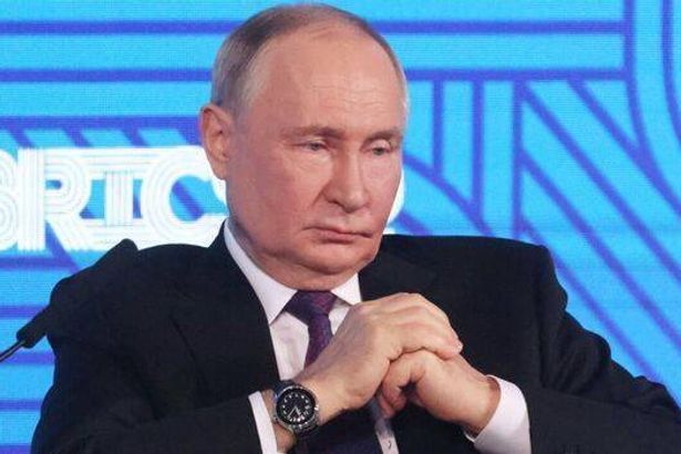1 Vladimir Putin looking sad