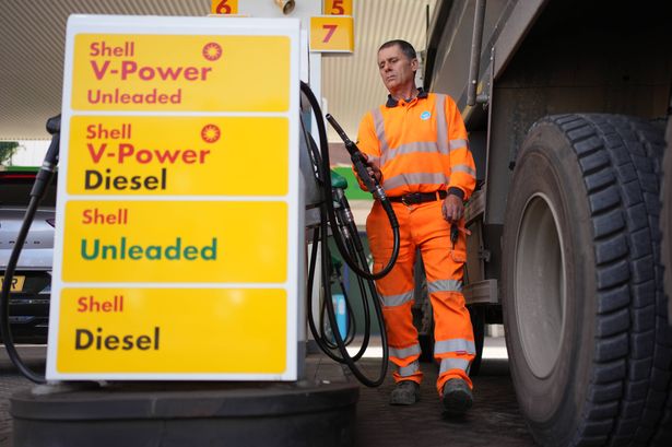2 A Thames Water employee filling his lorry with diesel at 2079p per litre at a petrol station North Woolwich Road Londo
